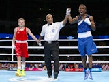 England's Nicola Adams celebrates winning against Northern Ireland's Michaela Walsh during their women's fly (48-51kg) final boxing match at the 2014 Commonwealth Games in Glasgow, Scotland, on August 2, 2014