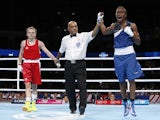 England's Nicola Adams celebrates winning against Northern Ireland's Michaela Walsh during their women's fly (48-51kg) final boxing match at the 2014 Commonwealth Games in Glasgow, Scotland, on August 2, 2014