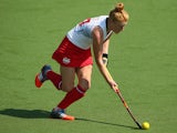 Nicola White of England runs the ball foward during the Women's preliminary match between England and Wales at Glasgow National Hockey Centre during day one of the Glasgow 2014 Commonwealth Games on July 24, 2014