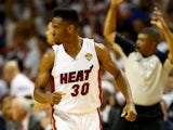 Norris Cole #30 of the Miami Heat reacts after hitting a shot against the San Antonio Spurs during Game Three of the 2014 NBA Finals at American Airlines Arena on June 10, 2014