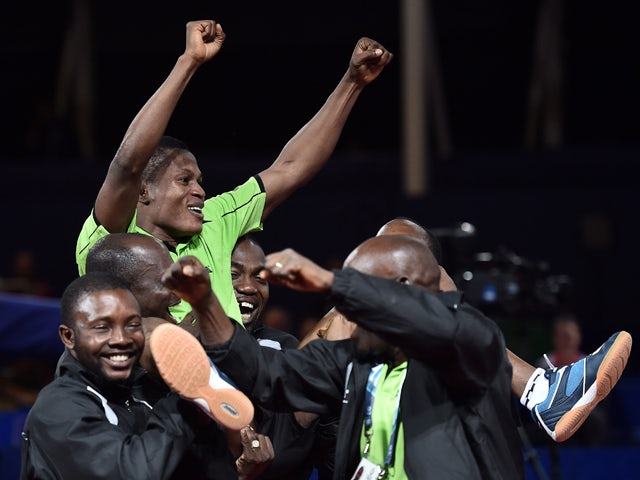 Nigeria's Ojo Onaolapo celebrates his victory against India's Kamal Sharath Achanta during their Bronze Medal Team table tennis match at the 2014 Commonwealth Games in Glasgow on July 28, 2014