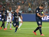 Paris Saint-Germain's Zlatan Ibrahimovic celebrates after scoring from a penalty against Guingamp, as teammates Marco Verratti (C) and Jean-Christophe Bahebeck react during the French season-opening Champions Trophy football match in Beijing on August 2, 