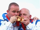 Paul Foster and Alex Marshall of Scotland celebrate with their gold medals after the Men's Pairs Final at Kelvingrove Lawn Bowls Centre during day five of the Glasgow 2014 Commonwealth Games on July 28, 2014