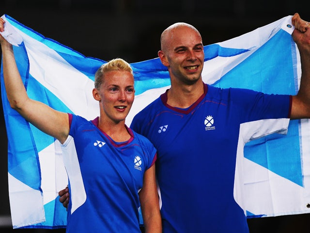 Robert Blair and Imogen Bankier of Scotland celebrate after winning the Mixed Doubles Bronze Medal match against Peng Soon Chan and Lai Pei Jing of Malaysia at Emirates Arena during day ten of the Glasgow 2014 Commonwealth Games on August 2, 2014