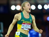 Sally Pearson of Australia celebrates winning gold in the Women's 100 metres hurdles final at Hampden Park during day nine of the Glasgow 2014 Commonwealth Games on August 1, 2014