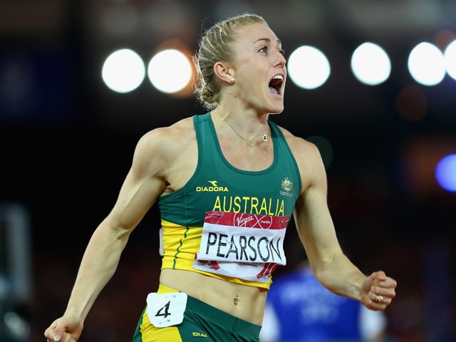 Sally Pearson of Australia celebrates winning gold in the Women's 100 metres hurdles final at Hampden Park during day nine of the Glasgow 2014 Commonwealth Games on August 1, 2014