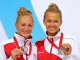 Sarah Barrow and Tonia Couch of England pose with their silver medals after finishing second in the women's synchronised 10m platform event at the Commonwealth Games on July 30, 2014