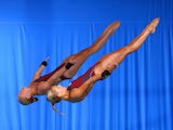 Sarah Barrow and Tonia Couch of England compete in the women's synchronised 10m platform event at the Commonwealth Games on July 30, 2014