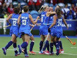 Nikki Kidd of Scotland celebrates with teammates after scoring a goal during the Women's preliminaries match between Scotland and England at Glasgow National Hockey Centre during day seven of the Glasgow 2014 Commonwealth Games on July 30, 2014