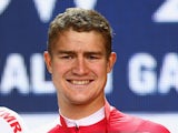 Scott Thwaites of England celebrates with his silver medal after the Men's Cycling Road Race during day eleven of the Glasgow 2014 Commonwealth Games on August 3, 2014