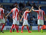 Bojan Krkic of Stoke City is congratulated by team-mate Marc Muniesa after scoring the equaliser during the pre season friendly match between Blackburn Rovers and Stoke City at Ewood Park on August 03, 2014