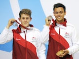 England's Tom Daley and James Denney pose on the podium after winning the silver medal in the Men's Synchronised 10m Platform Diving Competition at the Royal Commonwealth Pool during the 2014 Commonwealth Games in Edinburgh, Scotland, on August 1, 2014