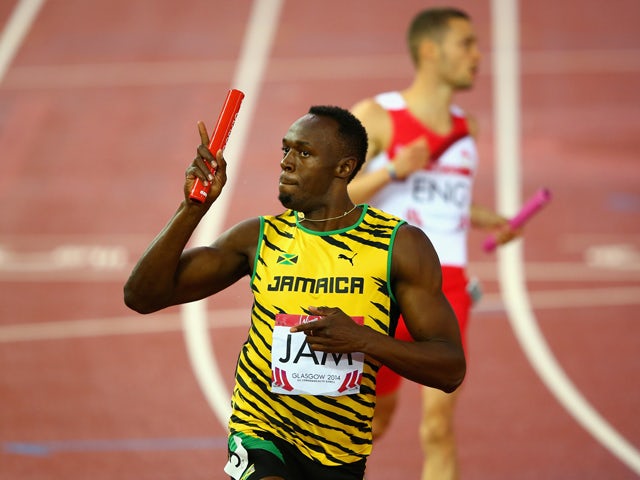 Usain Bolt of Jamaica celebrates winning gold in the Mens 4x100 metres relay final at Hampden Park during day ten of the Glasgow 2014 Commonwealth Games on August 2, 2014