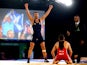 Viorel Etko of Scotland celebrates winning the bronze medal against Adam Vella of Malta in the Men's FS 61kg at the Scottish Exhibition and Conference Centre during day seven of the Glasgow 2014 Commonwealth Games on July 30, 2014