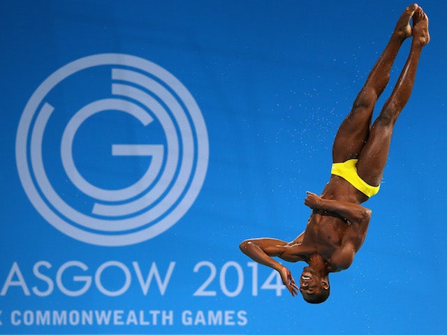 Jamaica's Yona Knight-Wisdom competes in the Commonwealth Games men's 3m springboard preliminaries at the Royal Commonwealth Pool in Edinburgh on July 31, 2014