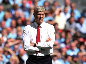Arsene Wenger watches on as Arsenal take on Man City during the Community Shield on August 10, 2014