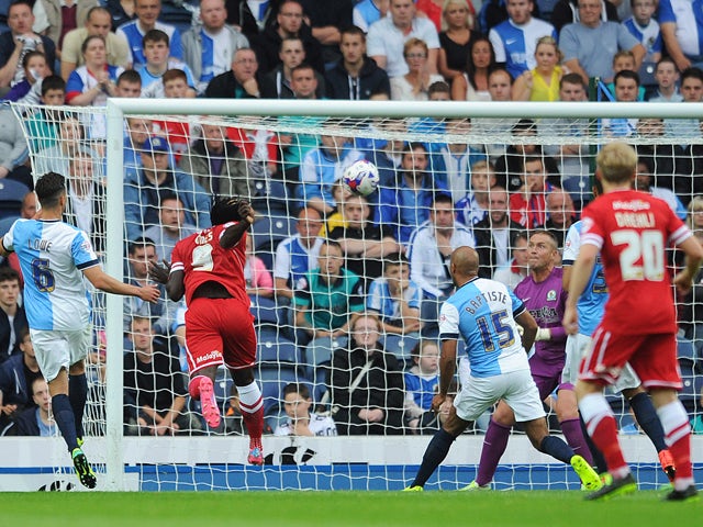 Kenwyne Jones of Cardiff City scores the opening goal during the Sky Bet Championship match between Blackburn Rovers and Cardiff City at Ewood Park on August 08, 2014 