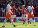Chris Burke celebrates scoring Nottingham Forest's second against Blackpool on August 9, 2014