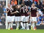 Danny Wilson is congratulated by Hearts teammates after he scores the opener against Rangers on August 10, 2014