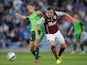 Dean Marney of Burnley in action with Yelko Pino of Celta Vigo during the pre season friendly match between Burnley and Celta Vigo at Turf Moor on August 05, 2014