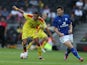 Dele Alli of MK Dons looks to control the ball watched by David Nugent of Leicester City during the Pre-Season Friendly match on August 4, 2014