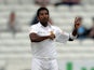 Sri Lanka's Dhammika Prasad celebrates dismissing England's Matt Prior during the fifth and final days play in the second Test cricket match between England and Sri Lanka at Headingley in Leeds, England on June 24, 2014