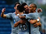 Emmanuel Riviere (C) of Newcastle celebrates his goal with team mates during the Pre Season Friendly match against Huddersfield Town on August 5, 2014