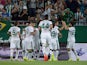 An assortment of Ferencvaros players celebrate scoring against Chelsea on August 10, 2014