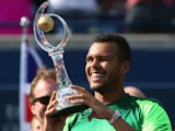 Jo-Wilfried Tsonga celebrates winning the Rogers Cup on August 10, 2014