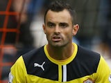 Joe Lewis of Cardiff City in action during the Barclays Premier League match between Hull City and Cardiff City at KC Stadium on September 14, 2013