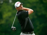 Marc Leishman of Australia hits off the sixth tee during the third round of the World Golf Championships-Bridgestone Invitational at Firestone Country Club South Course on August 2, 2014