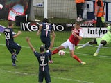 Paris Saint-Germain's players celebrate after scoring during the French L1 football match between Reims and Paris Saint-Germain (PSG), on August 8, 2014