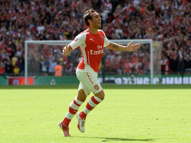 Santi Cazorla celebrates scoring Arsenal's opener against Man City in the Community Shield on August 10, 2014