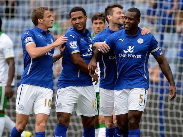 Wes Morgan celebrates scoring the opener for Leicester in their friendly with Werder Bremen on August 9, 2014