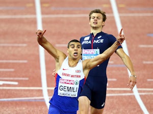 Gemili equals PB to win 200m gold