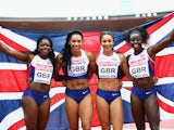 Asha Philip, Ashleigh Nelson, Anyika Onuora and Desiree Henry pose with a Union Jack after winning gold in the Women's 4x100 metres relay final during day six of the 22nd European Athletics Championships at Stadium Letzigrund on August 17, 2014