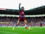  Andreas Weimann of Aston Villa celebrates scoring the opening goal during the Barclays Premier League match between Stoke City and Aston Villa at Britannia Stadium on August 16, 2014