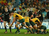Rob Simmons of the Wallabies passes during The Rugby Championship match between the Australian Wallabies and the New Zealand All Blacks at ANZ Stadium on August 16, 2014