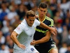 Leeds's Billy Sharp and Middlesbrough's Daniel Ayala grapple for the ball on August 16, 2014