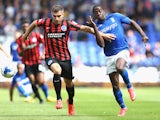 Clayton Donaldson of Birmingham City tangles with Aaron Hughes of Brighton & Hove Albion during the Sky Bet Championship match between Birmingham City and Brighton & Hove Albion at St Andrews (stadium) on August 16, 2014