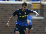 Bruno Zuculini #36 of Manchester City controls the ball against the Olympiacos during the International Champions Cup match on August 2, 2014