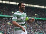 Charlie Mulgrew of Celtic celebrates after he scores during the Scottish Premiership League Match between Celtic and Dundee United, at Celtic Park on August 16, 2014