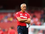 Keith Millen, caretaker manager of Crystal Palace looks on prior to the Barclays Premier League match between Arsenal and Crystal Palace at Emirates Stadium on August 16, 2014