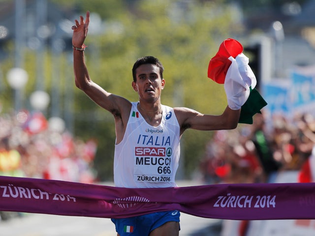 Daniele Meucci of Italy celebrates as he wins gold in the Men's Marathon during day six of the 22nd European Athletics Championships on the road race course on August 17, 2014 