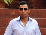 Pakistani discarded cricket leg-spinner Danish Kaneria leaves after appeared the integrity committee at the Gaddafi stadium in Lahore on August 15, 2011