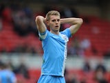 Danny Rose of Barnsley looks dejected during the Sky Bet Championship match between Middlesbrough and Barnsley at the Riverside Stadium on April 26, 2014