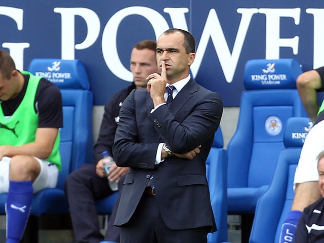 Everton's Spanish manager Roberto Martinez reacts to Leicester City's second equalising goal during the English Premier League football match between Leicester City and Everton at King Power Stadium in Leicester, central England on August 16, 2014