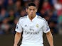 James Rodriguez of Real Madrid controls the ball during the UEFA Super Cup between Real Madrid and Sevilla FC at Cardiff City Stadium on August 12, 2014