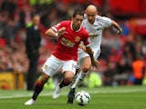 United's Javier Hernandez is chased by Jonjo Shelvey of Swansea on August 16, 2014