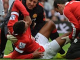 Man United's Jesse Lingard lies on the pitch injured during the game with Swansea on August 16, 2014